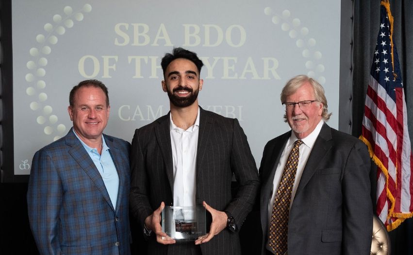 Cam Nayebi accepting the Coleman SBA BDO of the Year award
